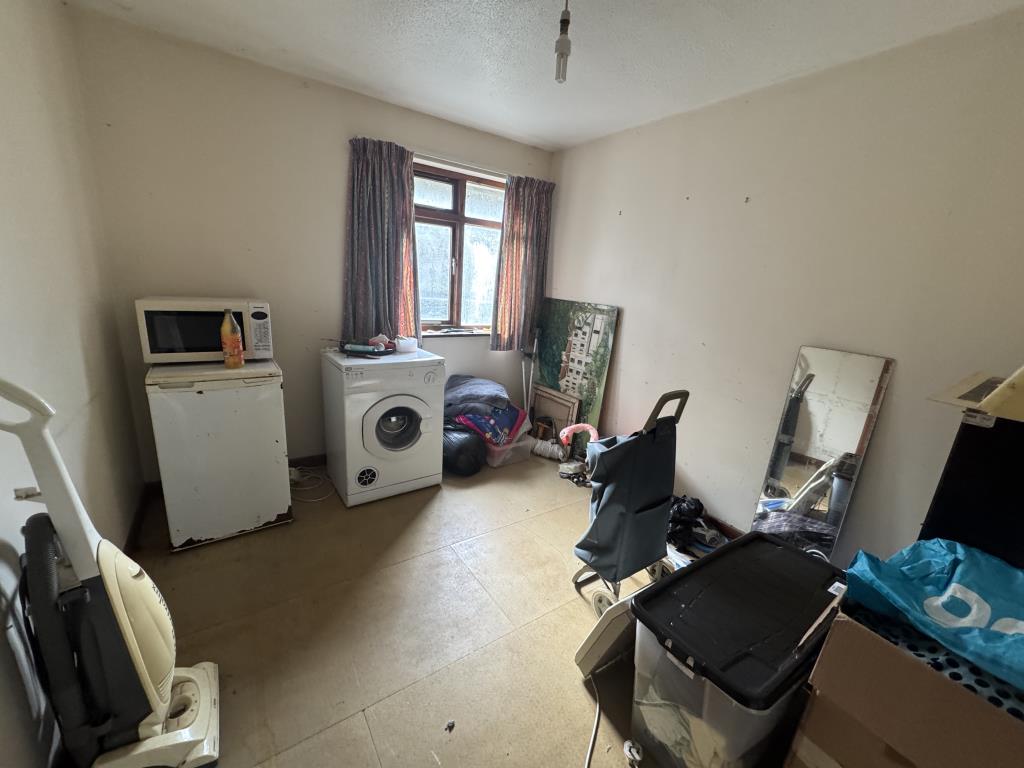 Lot: 111 - DETACHED BUNGALOW ON LARGE PLOT WITH DILAPIDATED BUILDING - View of bedroom one